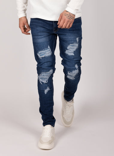 Blue Patchy Ripped Jeans