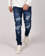 Blue Patchy Ripped Jeans