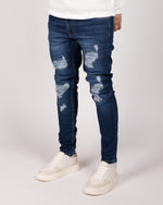 Blue Patchy Ripped Jeans